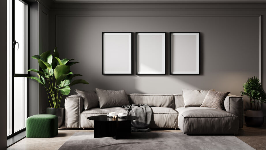 Stylish living room interior background with three poster frames