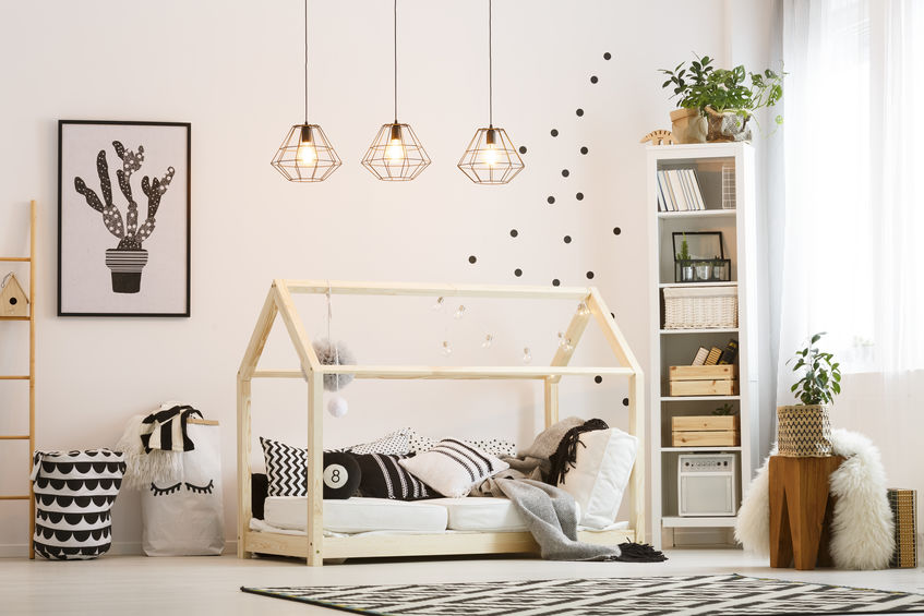 Eco friendly child bedroom with wood bed and modern lamps